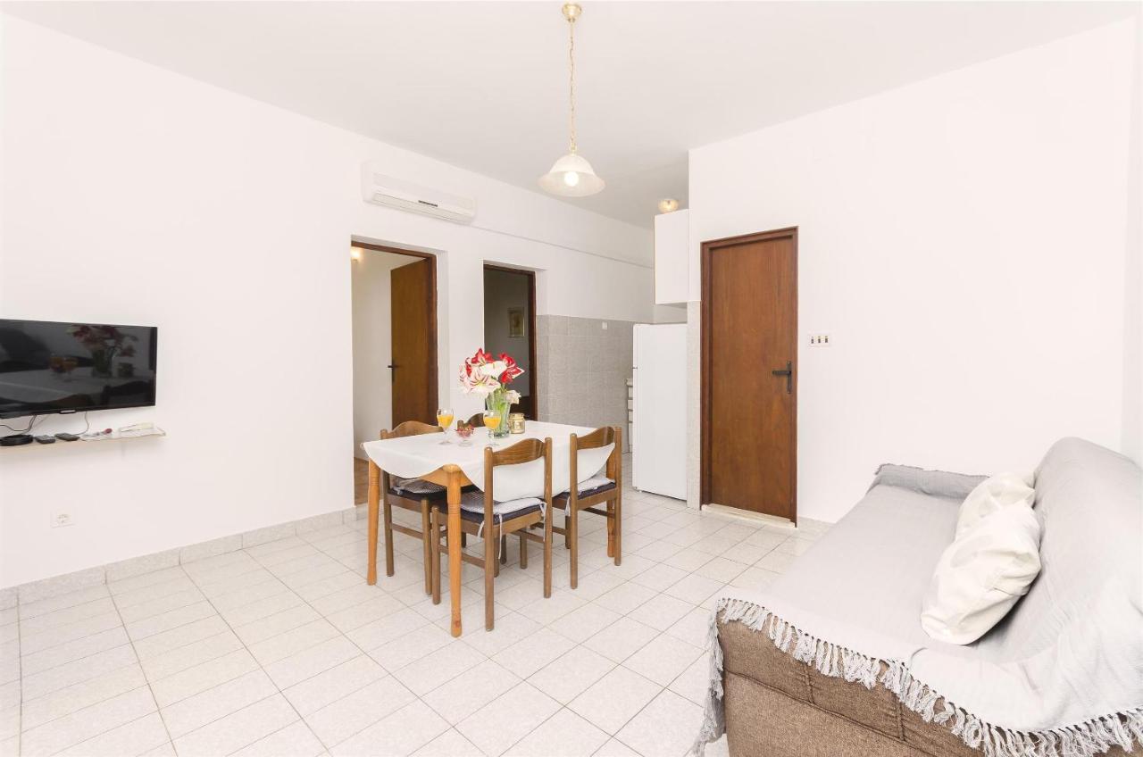 Apartments And Room Lotus Tribalj Exterior foto